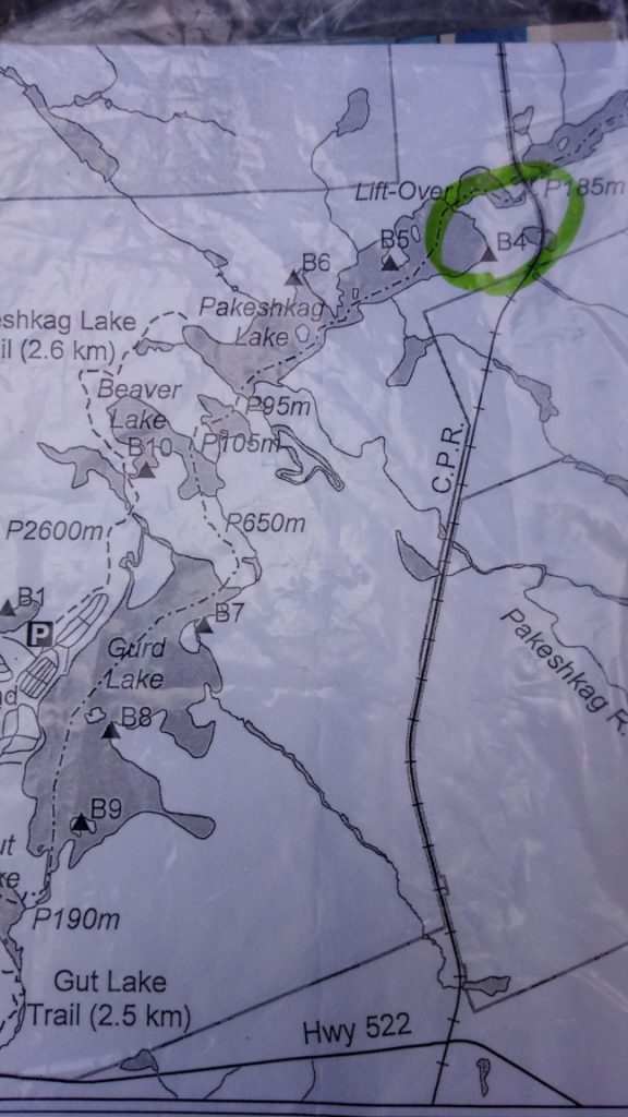 A photo of part of the park map, showing the canoe route from Gurd Lake to Pakeshkag Lake